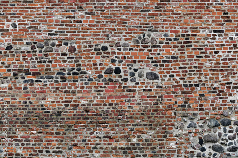 Old Red Brick Wall with Lots of Texture and Color. Old Red Brick Wall with Lots of Texture and Color.