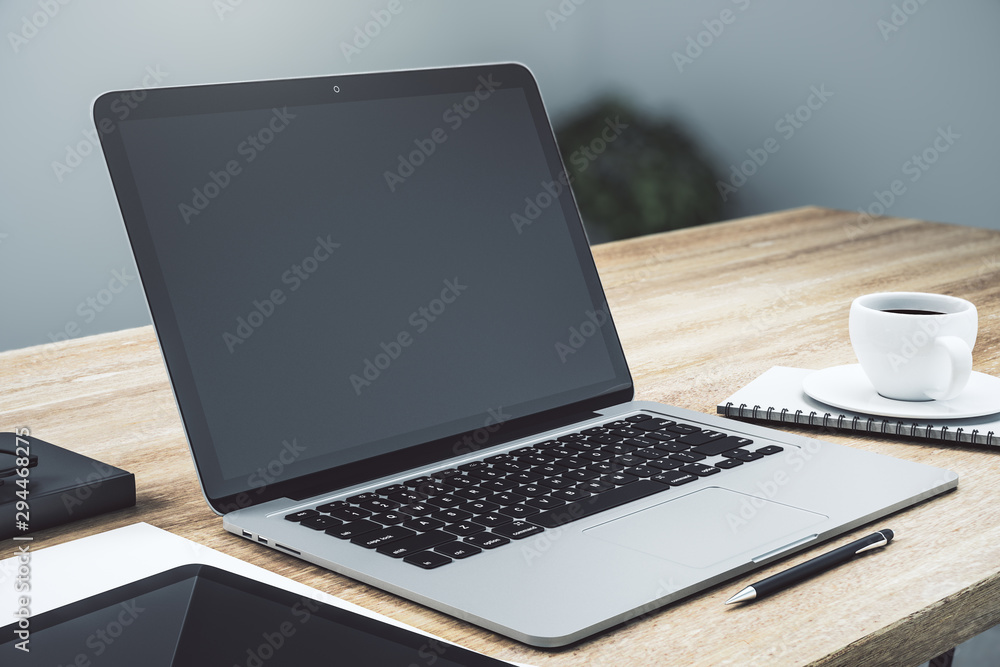 Modern workspace with empty laptop Modern workspace with empty laptop