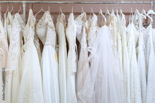 Stand with many beautiful wedding dresses.