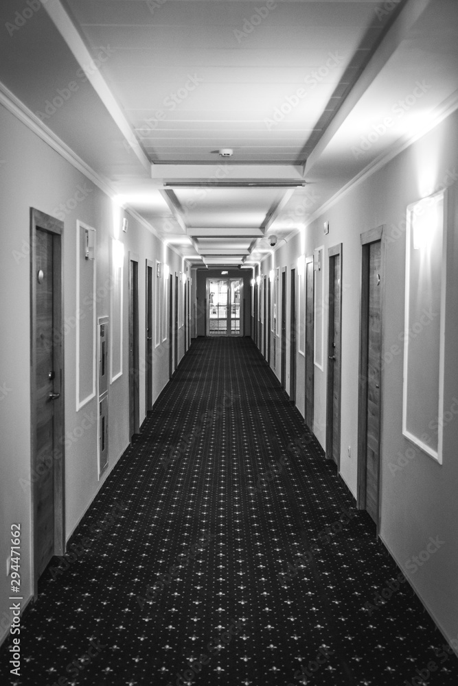 Corridor pathway in modern building. Black and white