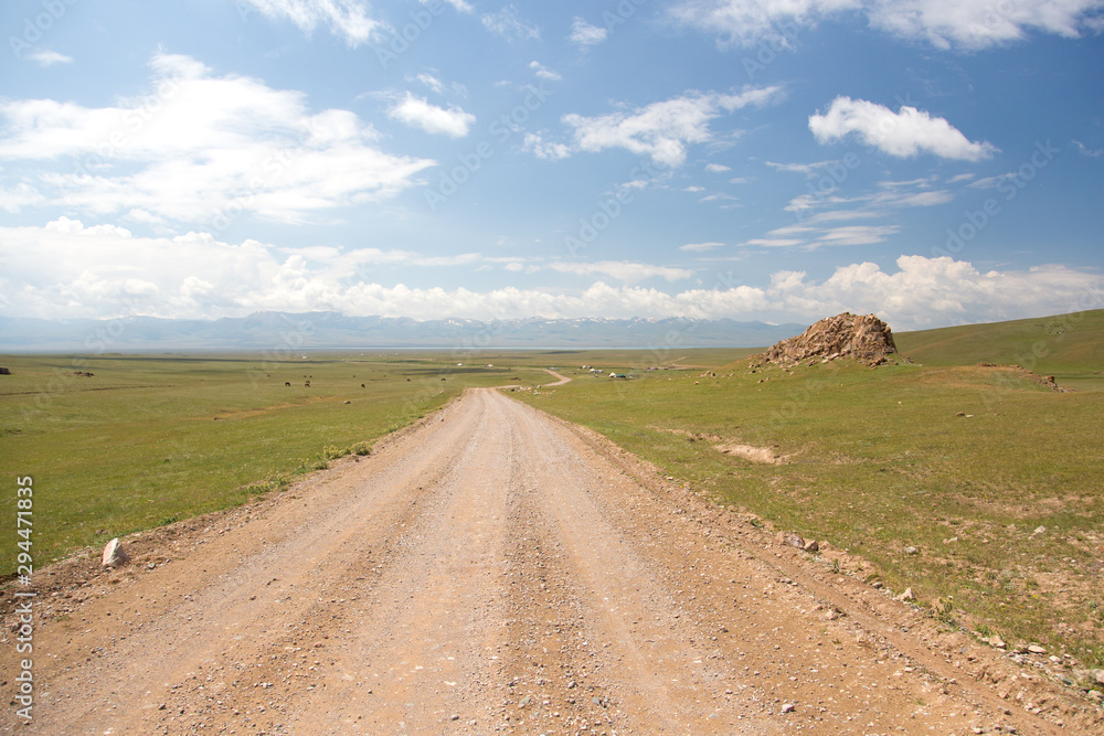 Obraz premium Road to Song kol lake - landscape of high plateau in Kyrgyzstan