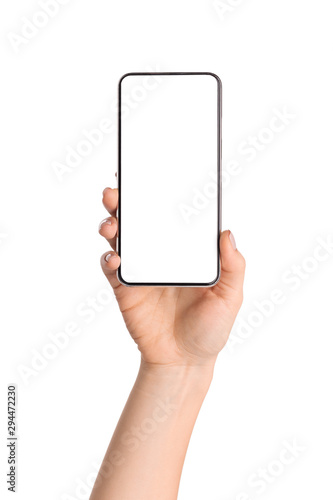 Female hand holding smartphone with blank screen over white background
