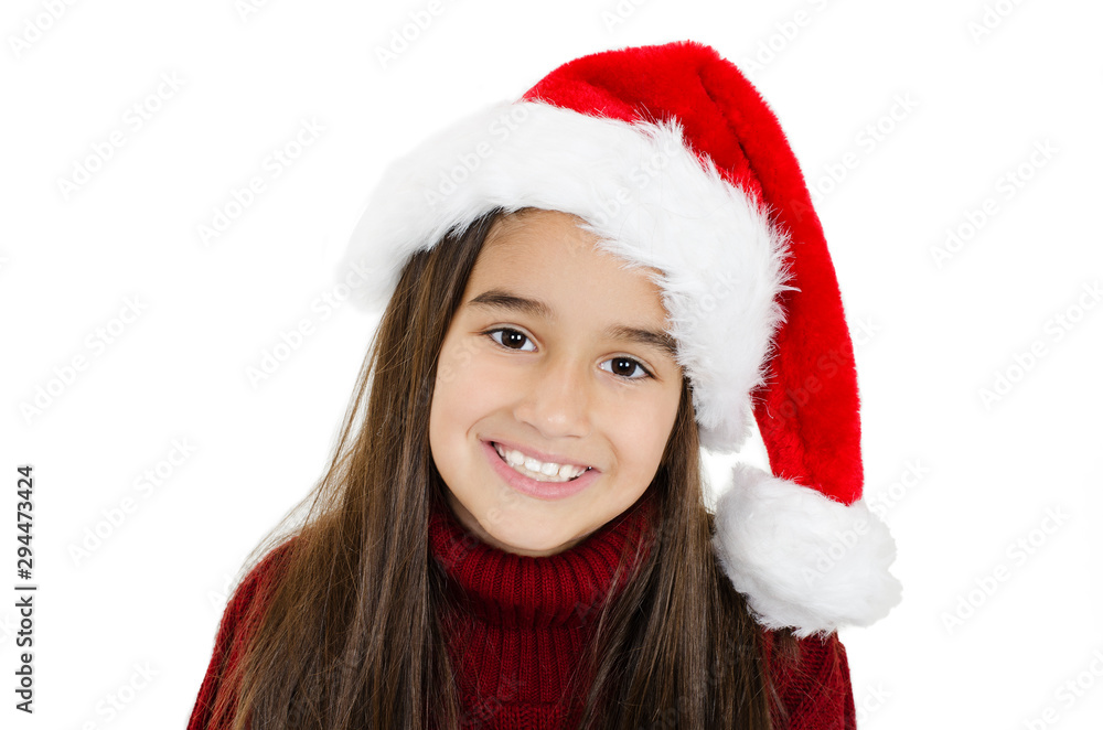Beautiful little girl in red Santa hat. Isolated on white background Beautiful little girl in red Santa hat. Isolated on white background