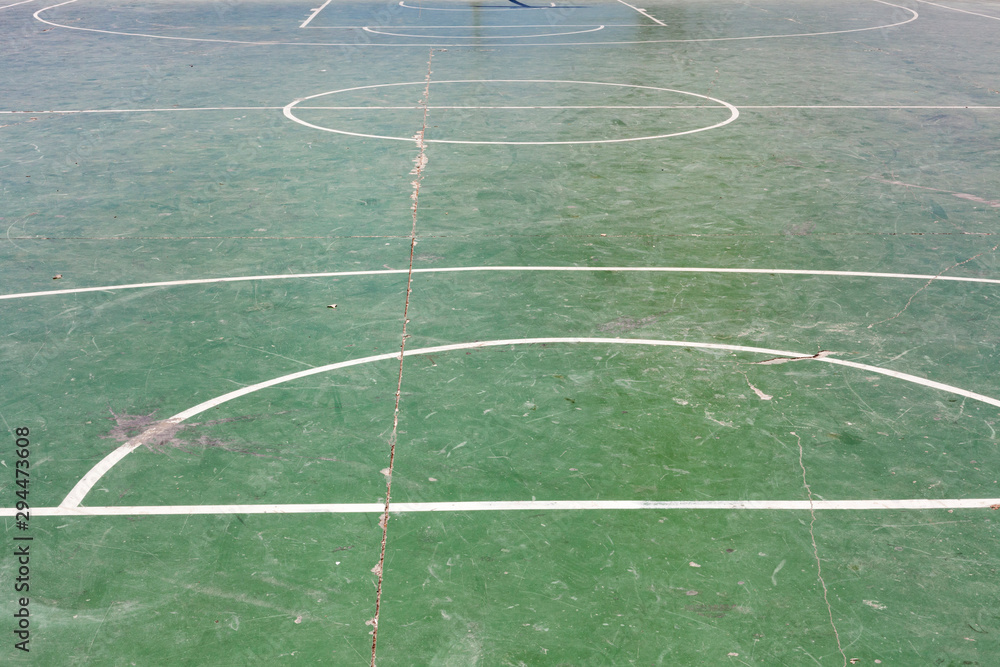 Basketball Field Rundown Damaged rundown basketball court on street. Outdoor sport arena ...