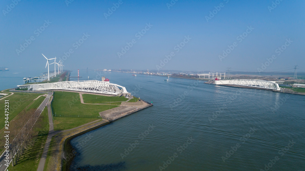 Aerial picture of Maeslantkering storm surge barrier on the Nieuwe Waterweg Netherlands it closes if the city of Rotterdam is threatened by floods and is one of largest moving structures on earth