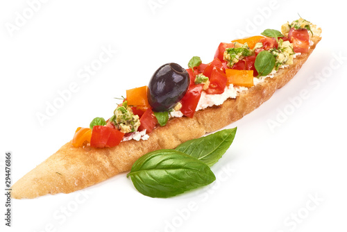 Italian Bruschetta with cottage cheese, tomatoes, garlic, olives and herbs. Spanish Tapas and Pinchos, isolated on white background