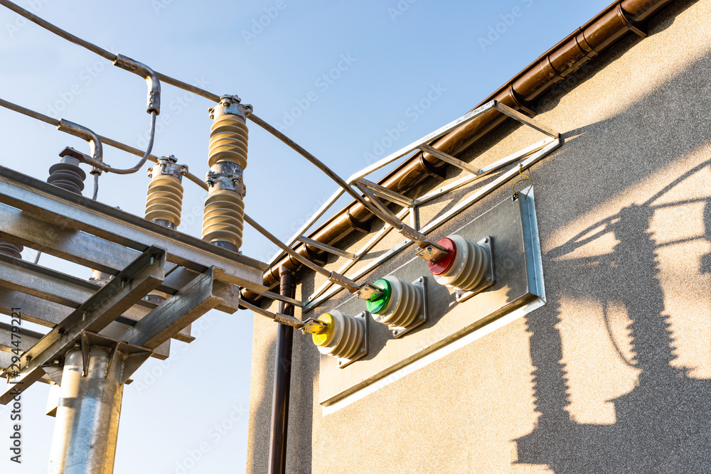 Fototapeta premium Insulators with non-insulated aluminum wire