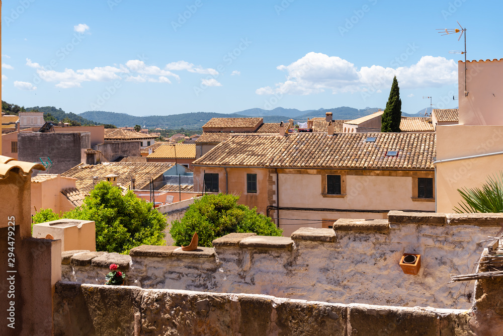 Obraz premium Architecture of the historic city of Capdepera located in the east of Majorca and neighboring the resort of Cala Ratjada. Spain