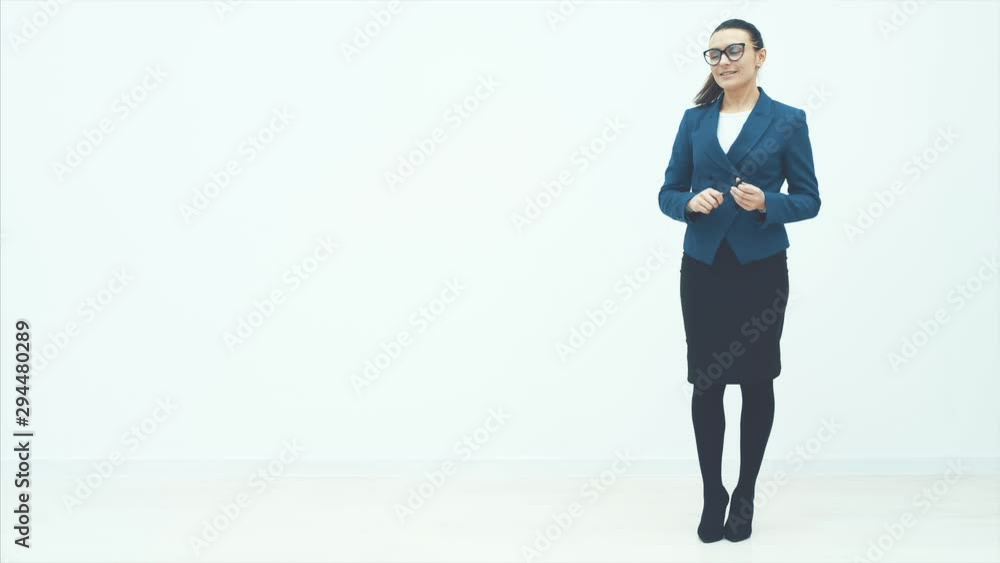Portrait of a beautiful caucasian businesswoman with folder and pen. Close up. Copy space. Portrait of a beautiful caucasian businesswoman with folder and pen. Close up. Copy space.