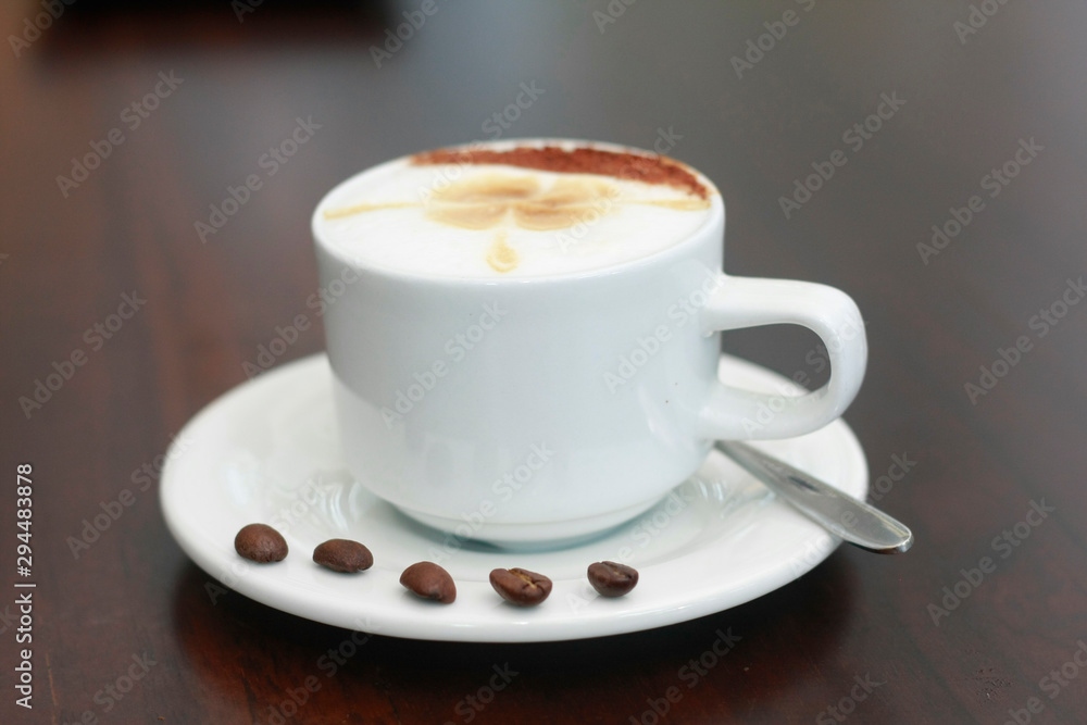 cup of coffee on black background cup of coffee on black background