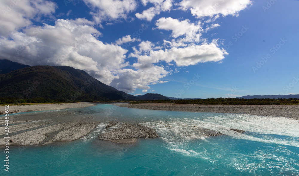 river of melted glacial water, West coast of New Zealand river of melted glacial water, West coast of New Zealand