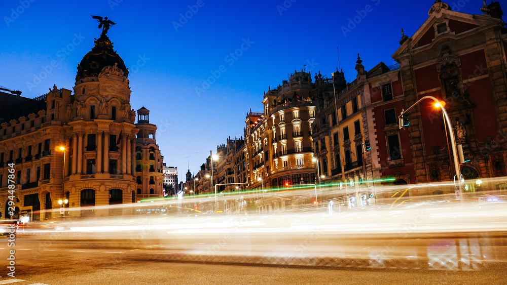 Madrid, Spain long exposure light streaks from moving vehicles at Calle de Alcala and Gran Via