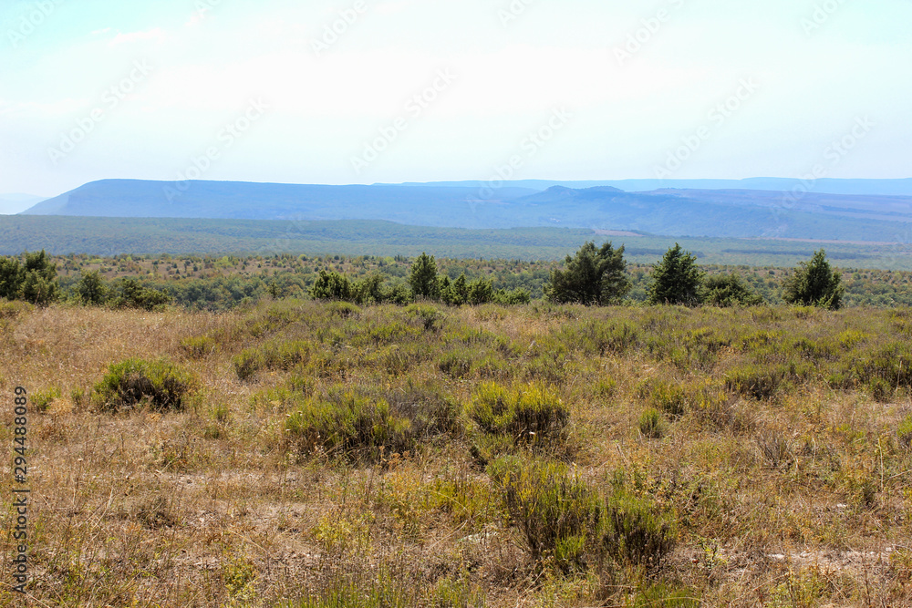 Mountain range in the haze on the horizon.