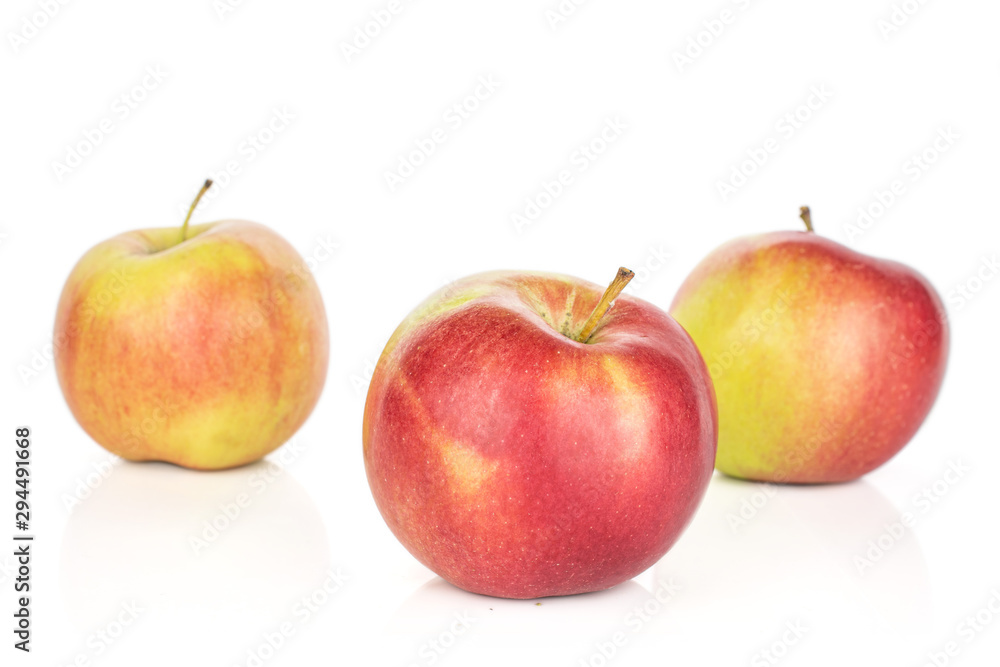 Group of three whole red apple jonagold front focus isolated on white background Group of three whole red apple jonagold front focus isolated on white background