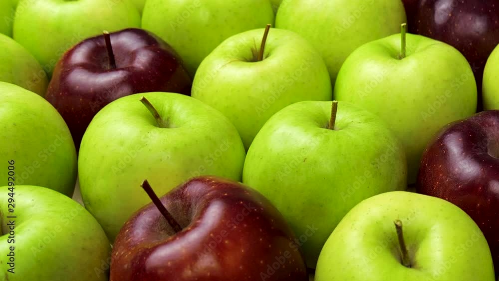 Red Apple In Green Apples. Many apples at table. Healthy diet Red Apple In Green Apples. Many apples at table. Healthy diet