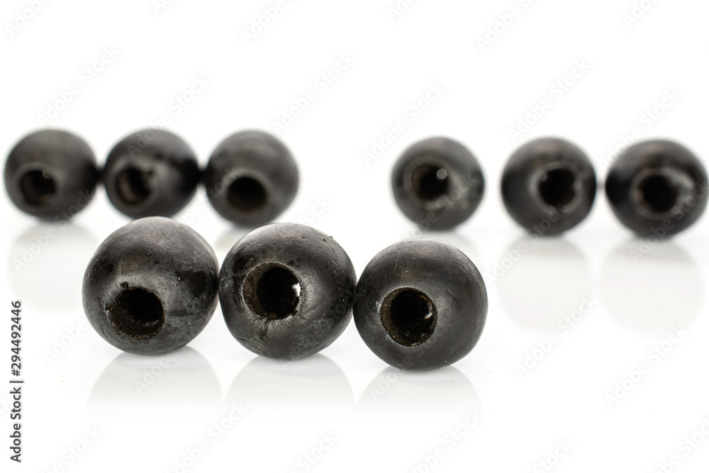 Group of nine whole tasty black olive isolated on white background Group of nine whole tasty black olive isolated on white background