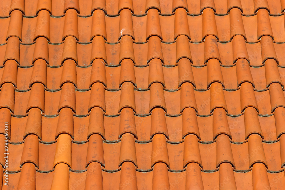 A roof tiled with imbrices and tegulae. Photo in perspective A roof tiled with imbrices and tegulae. Photo in perspective