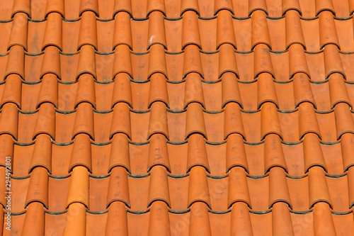 A roof tiled with imbrices and tegulae. Photo in perspective
