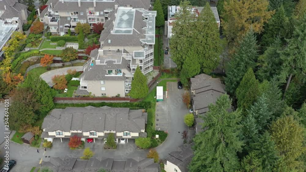 A perfect neighbourhood. Houses in suburb at Summer in the north America. Luxury houses with nice landscape. Aerial drone view. 4K. A perfect neighbourhood. Houses in suburb at Summer in the north America. Luxury houses with nice landscape. Aerial drone view. 4K.