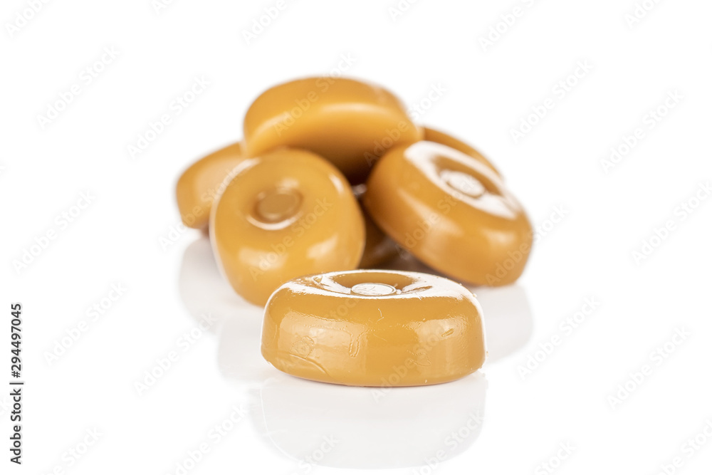 Lot of whole caramel brown candy isolated on white background Lot of whole caramel brown candy isolated on white background