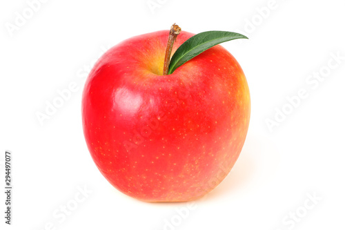 red apples with green leaves isolated on a white background
