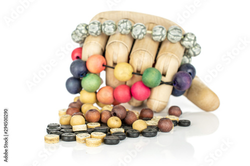 Lot of whole arranged wooden bead with wooden hand isolated on white wood