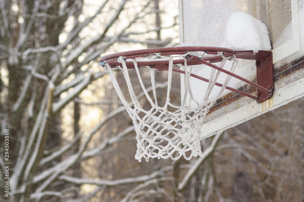 Basketball basket covered with frost