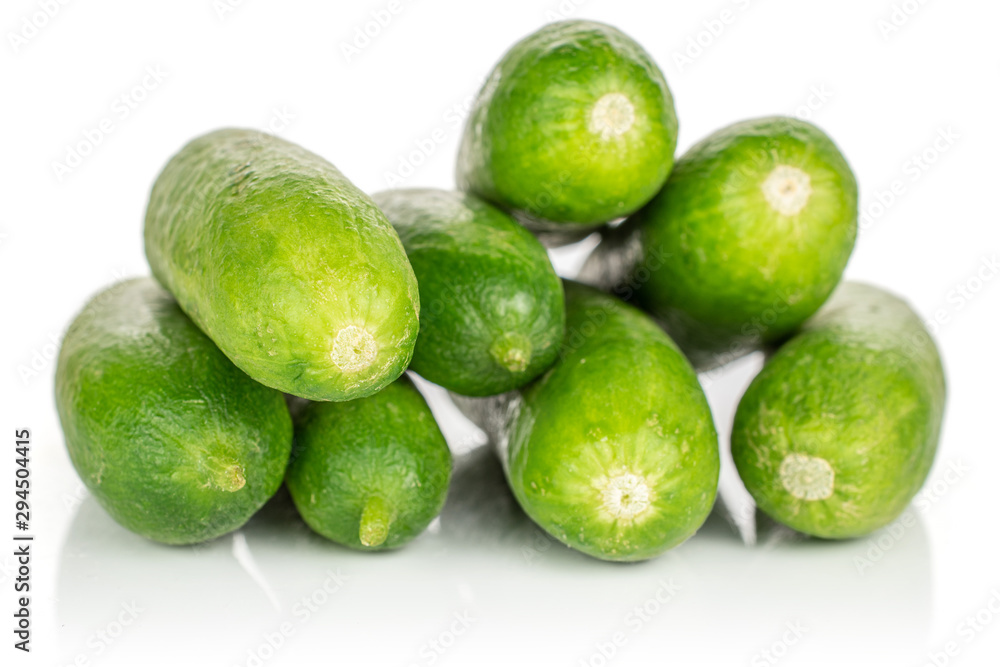 Group of seven whole mini green cucumber isolated on white background Group of seven whole mini green cucumber isolated on white background