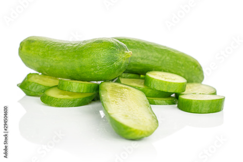 Group of two whole lot of pieces of mini green cucumber isolated on white background