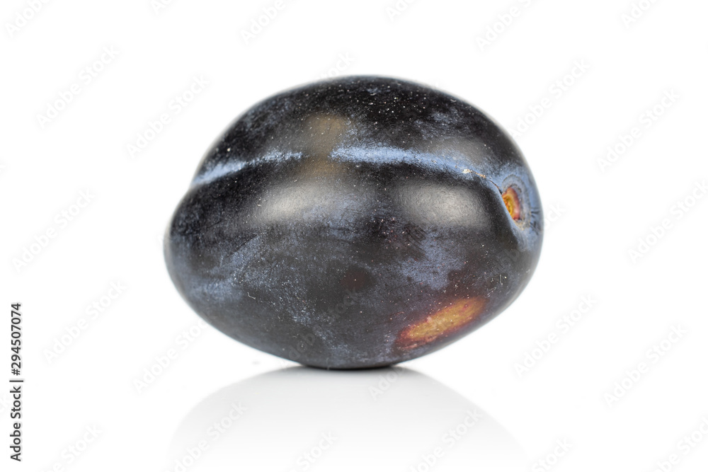One whole fresh purple plum isolated on white background One whole fresh purple plum isolated on white background