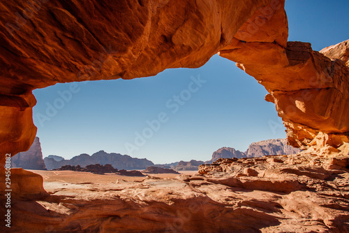 Framed view of Wadi Rum desert from Little Bridge rock formation, Jordan