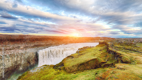 Dramatic sunset view of the most powerful waterfall in Europe called Dettifoss