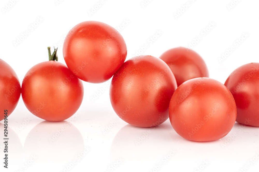 Group of seven whole fresh red tomato isolated on white background Group of seven whole fresh red tomato isolated on white background