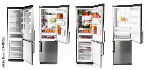 Big modern fridge on white background photo
