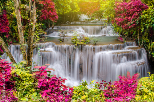 Travel to the beautiful waterfall in tropical rain forest, soft water of the stream in the Huai Mae Khamin Waterfall level 4, Khuean Srinagarindra National Park, Kanchanaburi, Thailand 