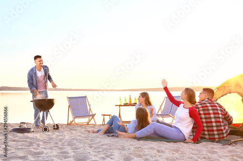 Friends at barbecue party n...