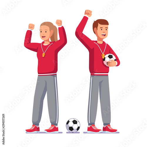 Soccer coaches raising hands and cheering players