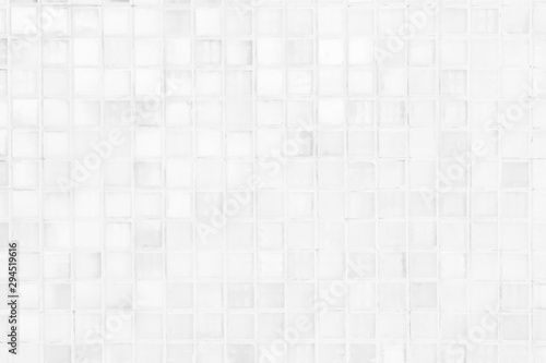 White or gray ceramic wall and floor tiles abstract background. Design geometric mosaic texture decoration of the bedroom. Simple seamless pattern for backdrop advertising banner poster or web.