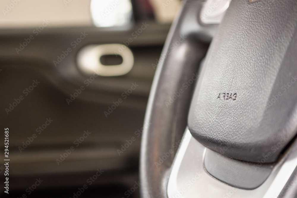 Obraz premium Safety airbag sign on car steering wheel