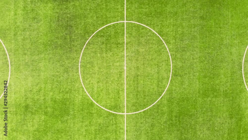 Aerial flying rise over football field and outdoor sport grounds. Taken by drone Aerial flying rise over football field and outdoor sport grounds. Taken by drone
