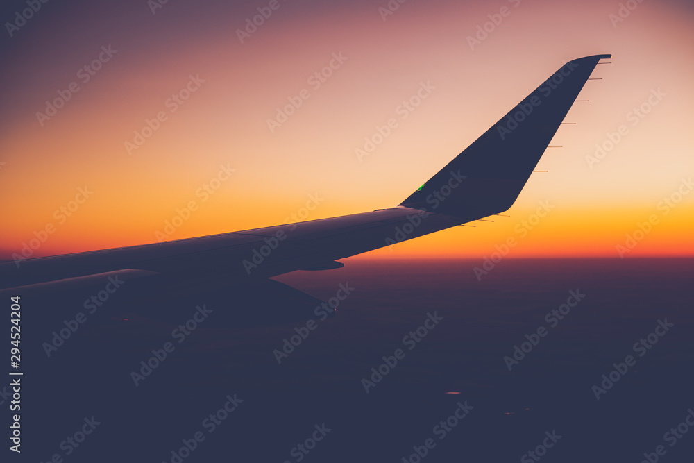 airplane flying above clouds airplane flying above clouds