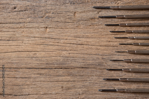Top view of Many sizes screwdriver on the wood background and  copy space