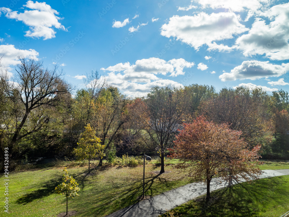 Kutzky Park with fall foliage on sunny day, changing leaves, Rochester, Minnesota Kutzky Park with fall foliage on sunny day, changing leaves, Rochester, Minnesota
