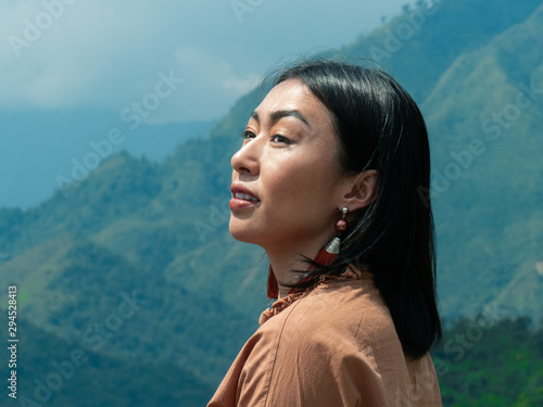 Beautiful lady with moutain scenery