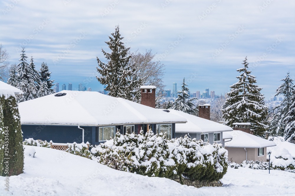 Street of residential houses in suburban of Vancouver on winter cloudy day Street of residential houses in suburban of Vancouver on winter cloudy day