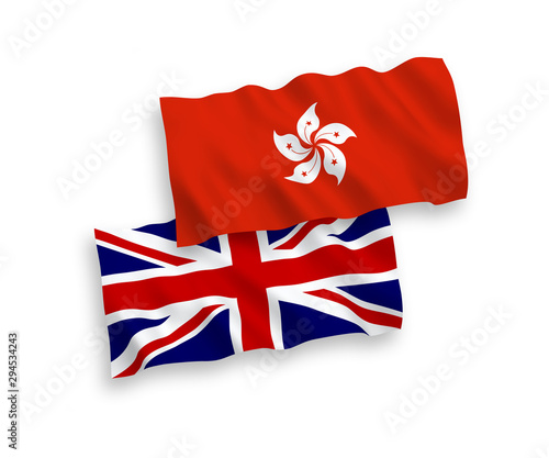 National vector fabric wave flags of Great Britain and Hong Kong isolated on white background. 1 to 2 proportion.
