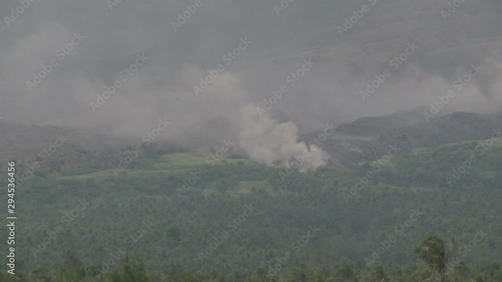 Lava Flow Burns Through Vegetation On Side Of Volcano Lava Flow Burns Through Vegetation On Side Of Volcano