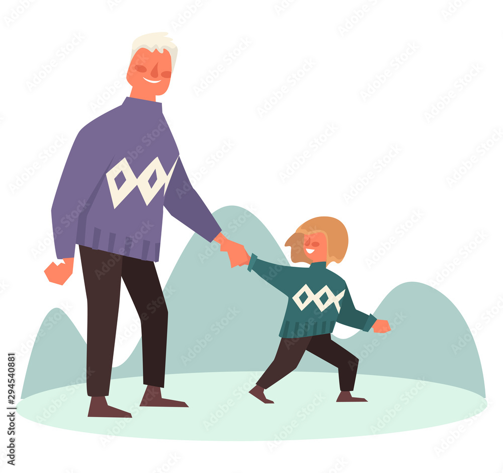 Dad and son walk outdoors on winter day holding hands Dad and son walk outdoors on winter day holding hands