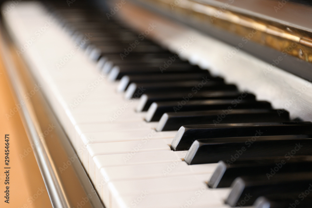 Black and white piano keys indoors, closeup Black and white piano keys indoors, closeup