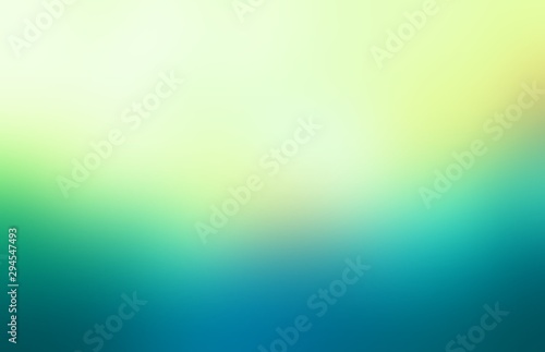 Abstract outdoor view defocus background. Natural green yellow blue colors gradient. Sunny sky and juicy glass of meadow formless pattern. Impressive summer blur illustration.